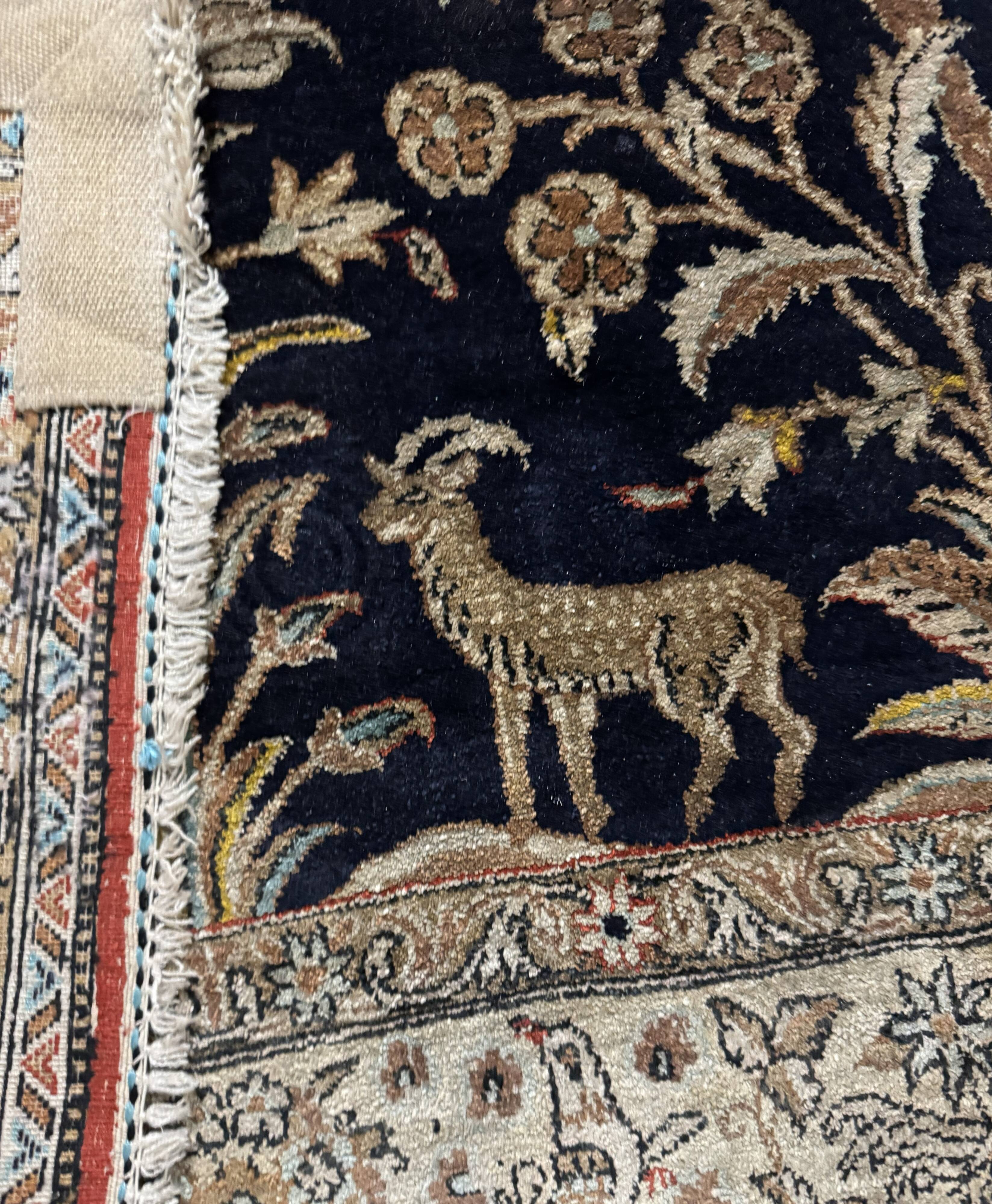 Handmade silk Persian carpet