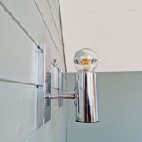 Pair of tubular wall sconces in chrome metal, 1970.