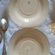 Old mismatched hollow plates in iron earth earthenware