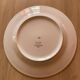 Porcelain plate with feather decoration