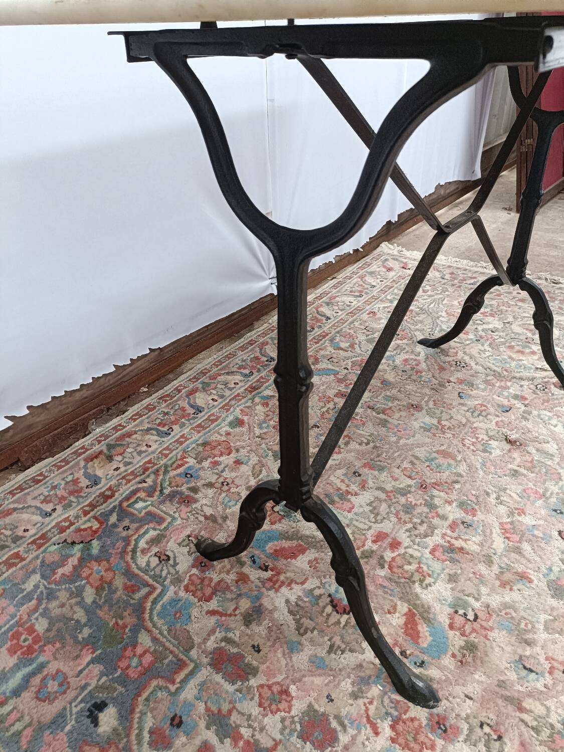 Bistro table with cast iron legs and marble top