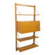 Wall shelf library with vintage light wood secretary bar