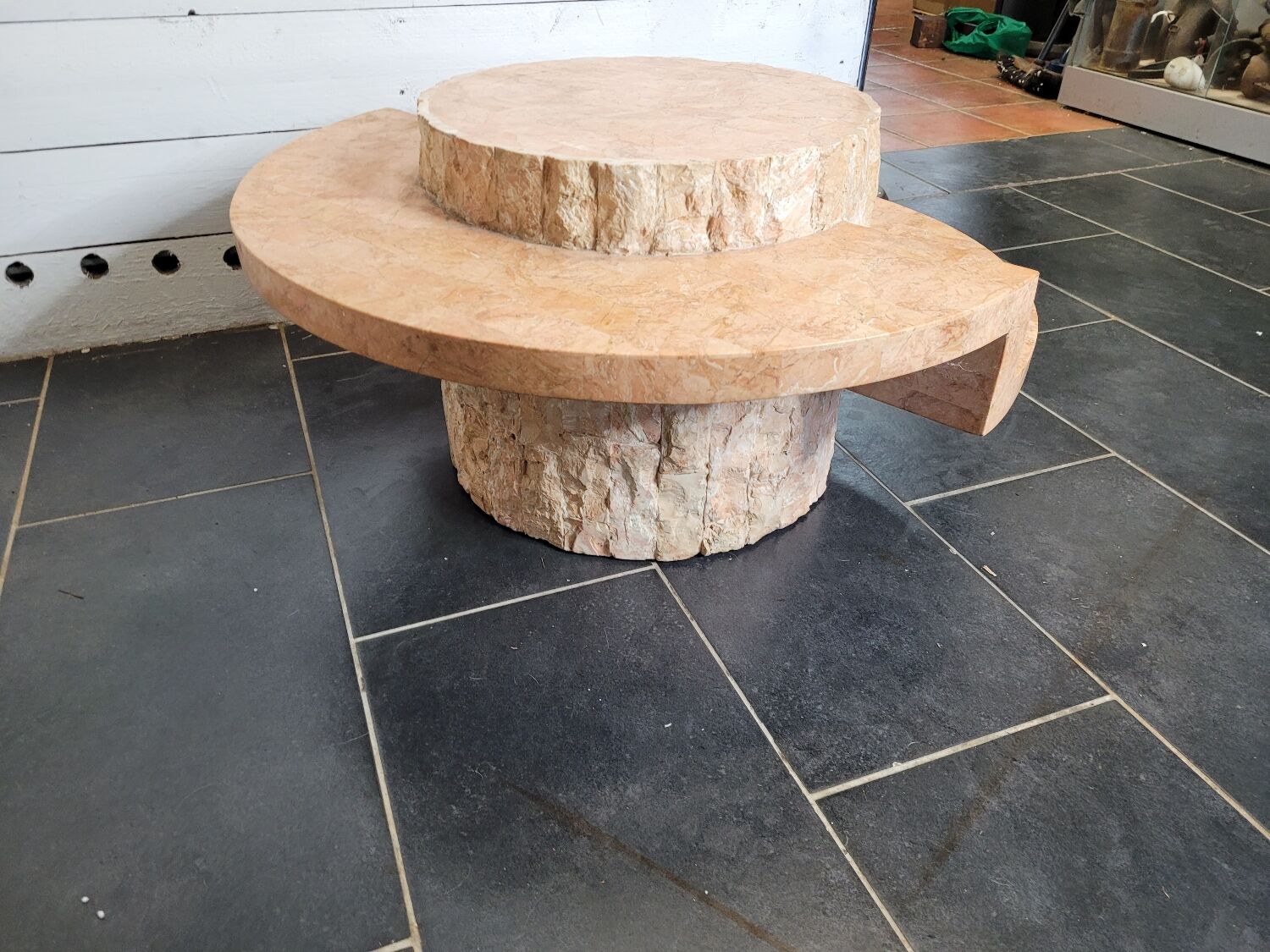 Round stone coffee table by Magnussen Ponte