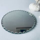 Old round beveled mirror