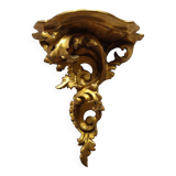 Baroque style golden shelf.