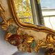 Miroir en bois doré décoré
