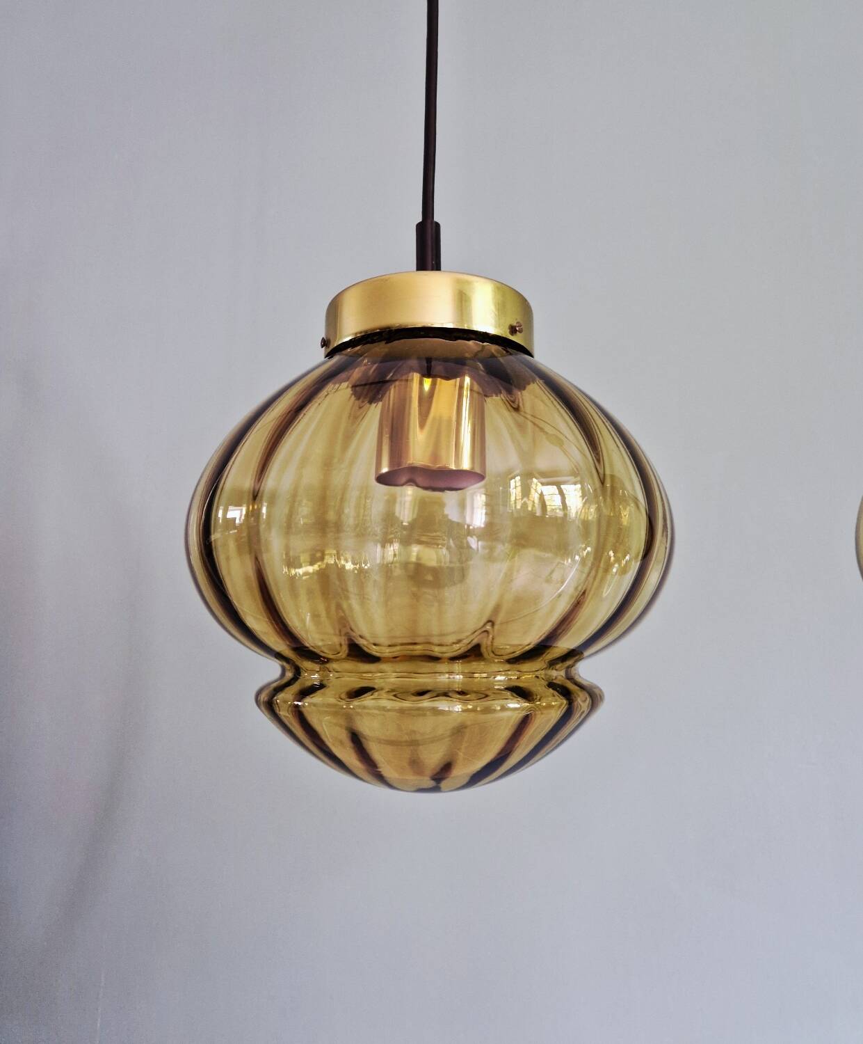 Set of 3 amber glass pendant lights, RAAK Amsterdam, 1970