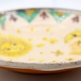 Handmade plate with moon and sun in Romania