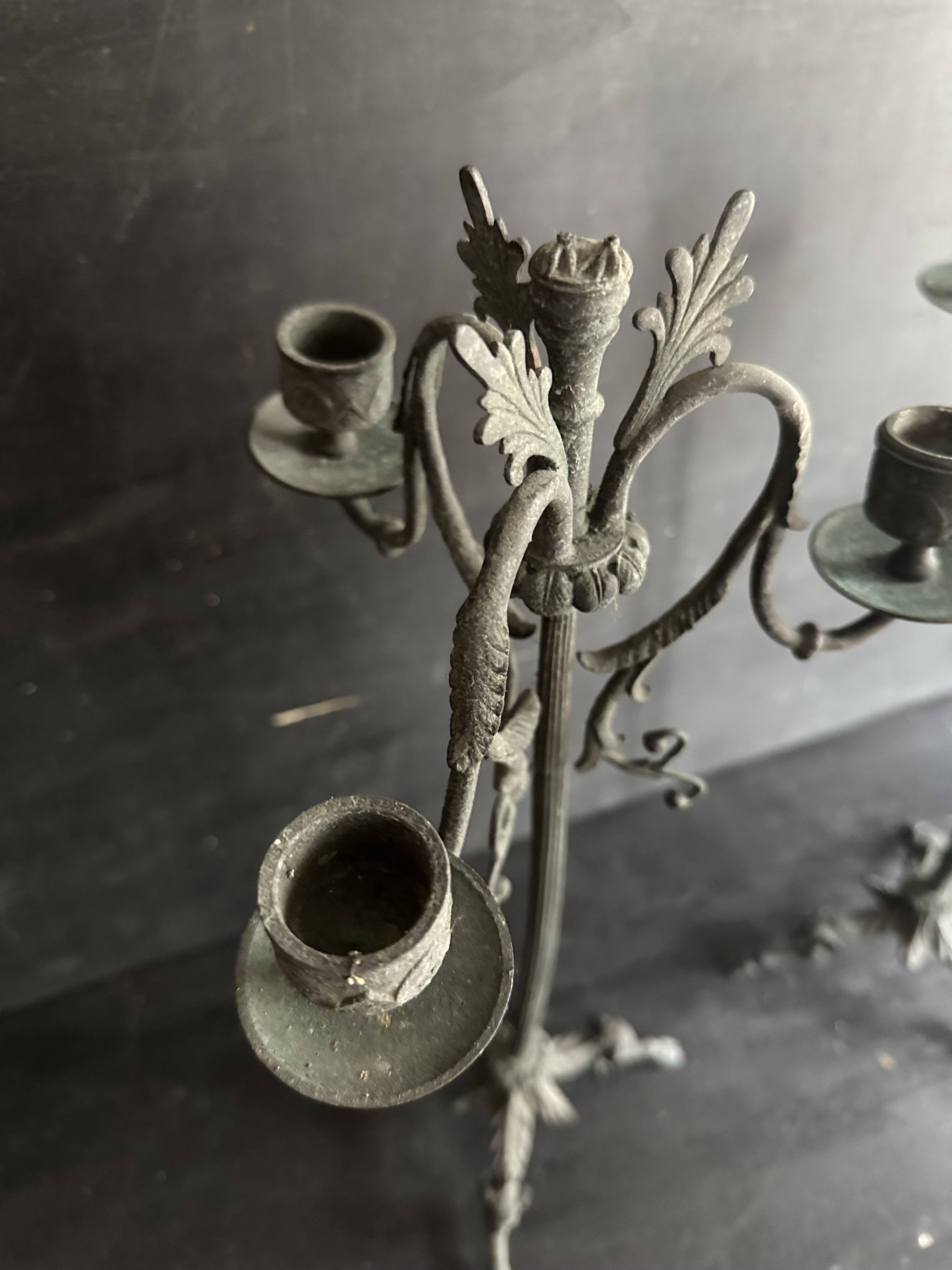Pair of large Napoleon III candlesticks in patinated bronze