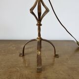 Large "Arts & Crafts" style lamp in beaten iron with a golden patina.