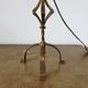 Large "Arts & Crafts" style lamp in beaten iron with a golden patina.