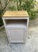 Beautiful art deco jam cupboard in delicate beige tone / and wicker basket