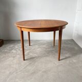 Scandinavian round teak table with extension