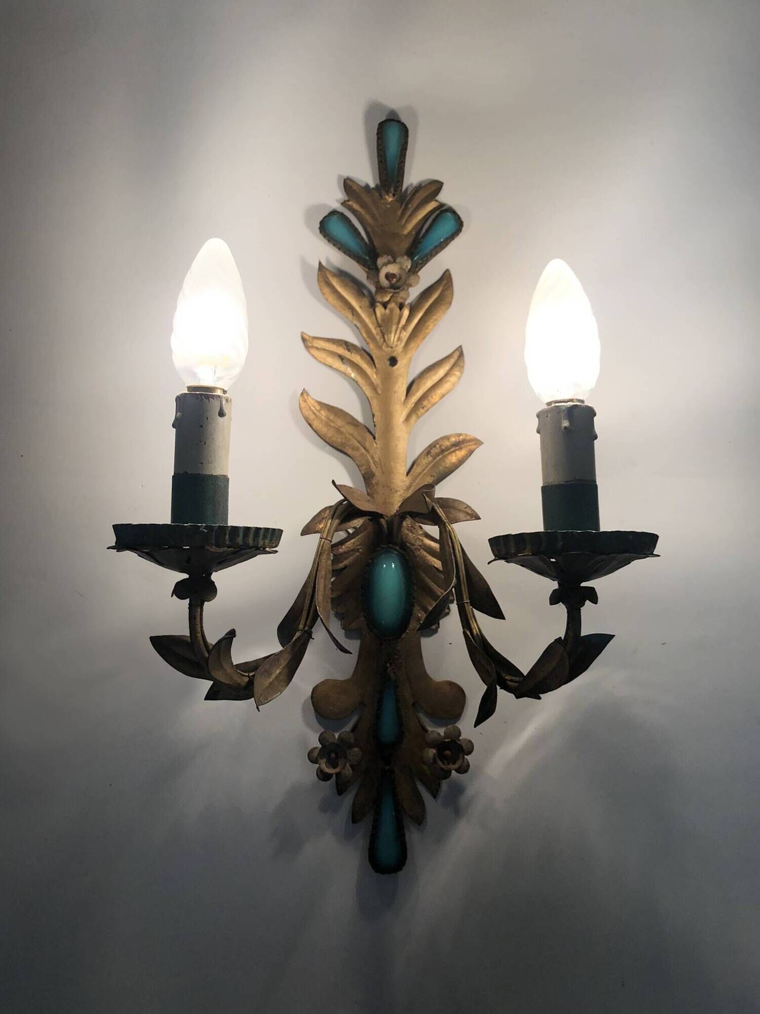 Pair of gold metal wall lights with turquoise glass inlay. 70