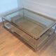 Table basse à double plateau en chrome et laiton