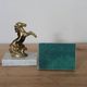 Pair of vintage bookends with rearing horses in gilded metal on marble bases.