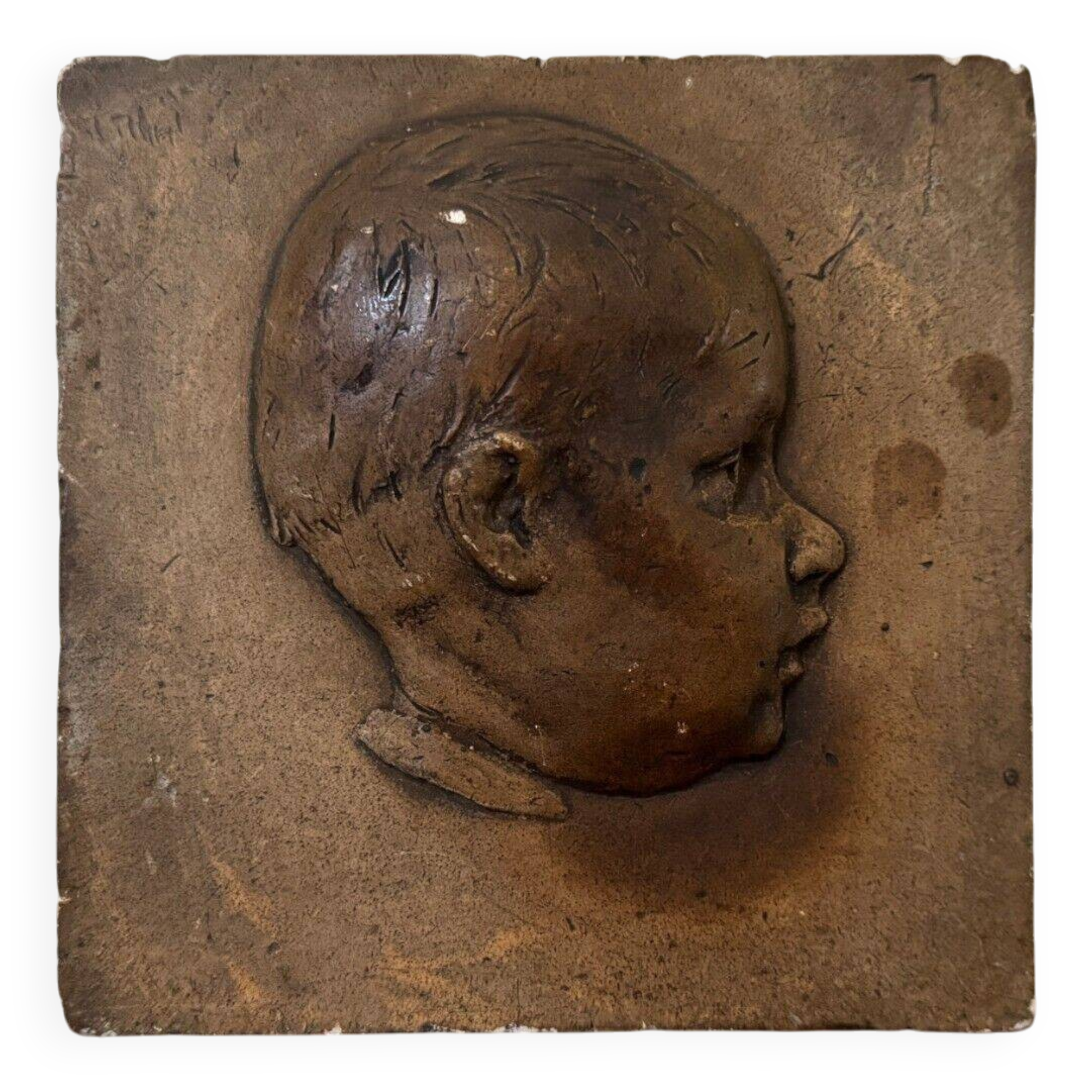 Workshop plaster medallion by Ch. Filleul, head of a young child, 20th century