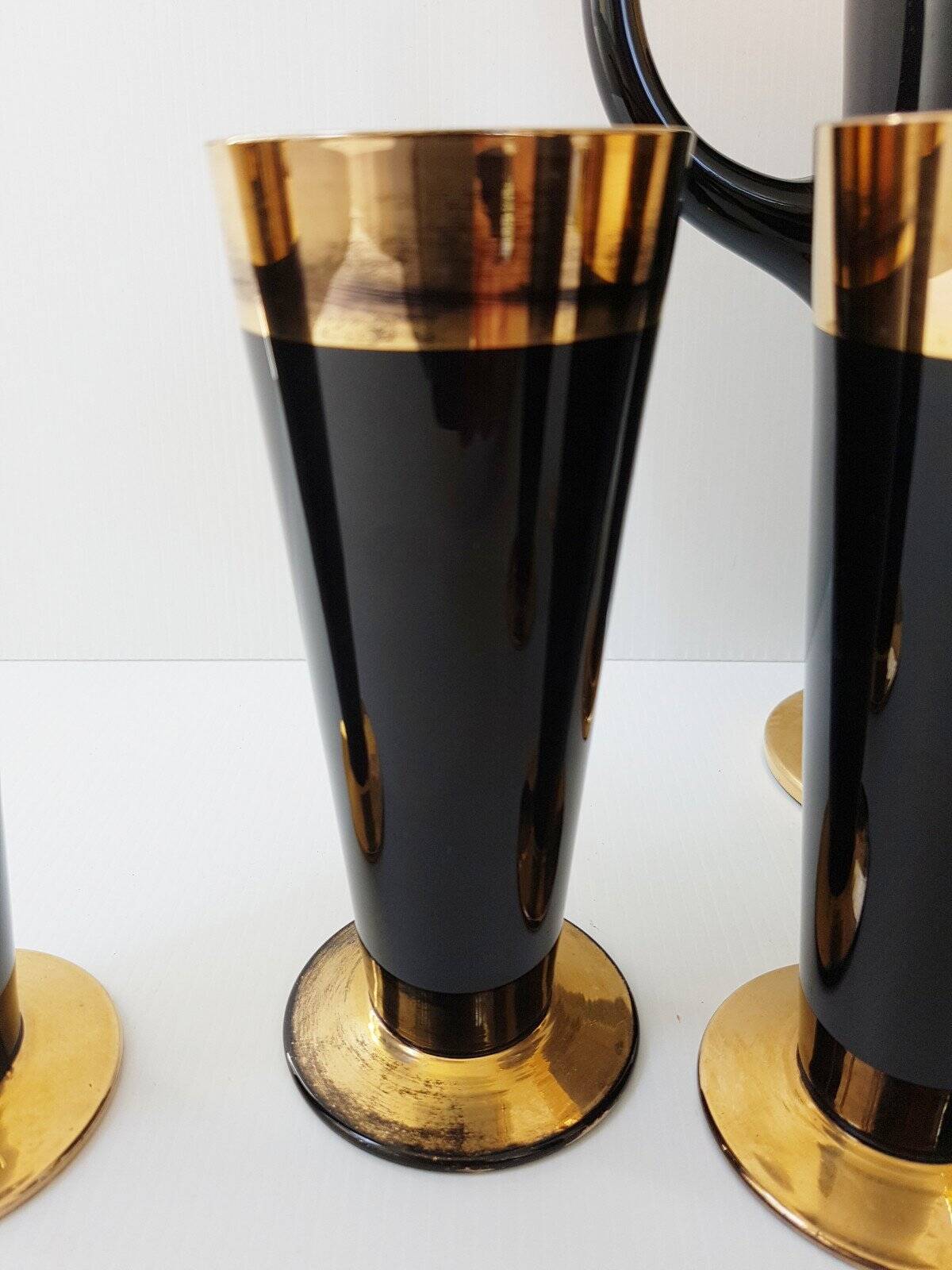 Vintage 1950s black and gold glass lemonade service.