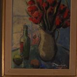 Bouquet rouge et bouteille de vin