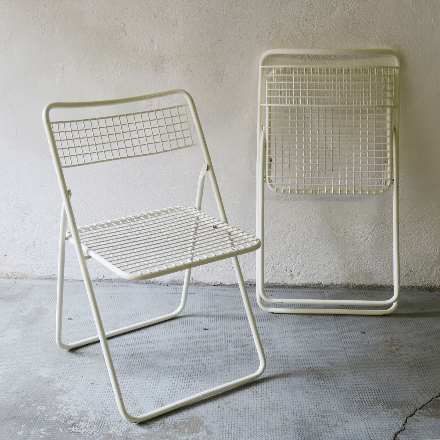 Pair of metal chairs