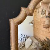 Patinated gilded mirror in wood and plaster