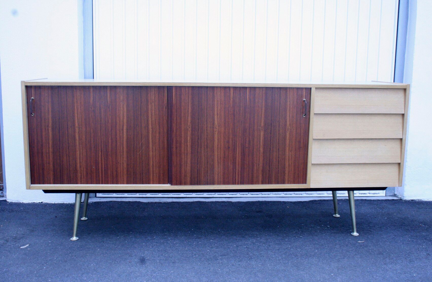 Midcentury sideboard with brass legs
