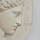 Visage antique en relief