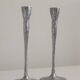 Pair of aluminium candle holders