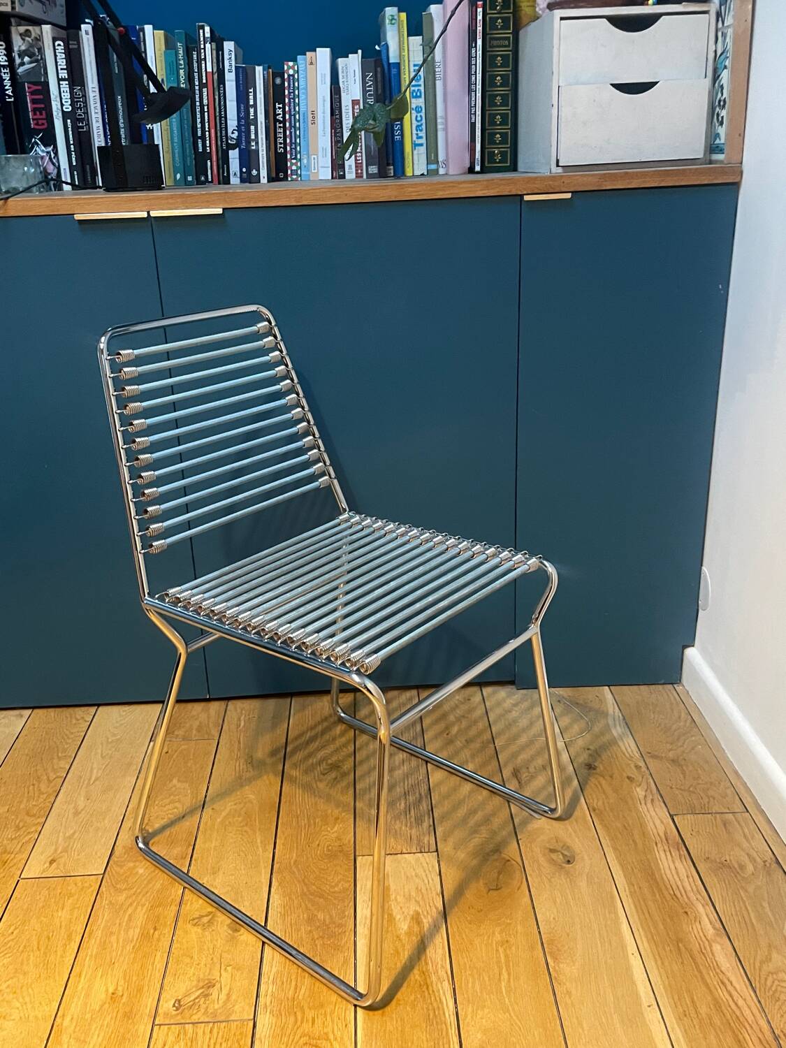 2 metal chairs with bungee cords