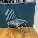 2 metal chairs with bungee cords