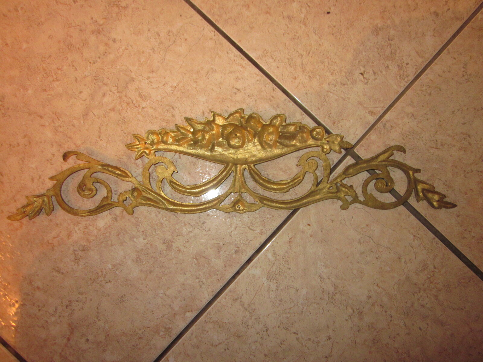 Former fronton in bronze