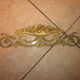 Fronton ancien en bronze