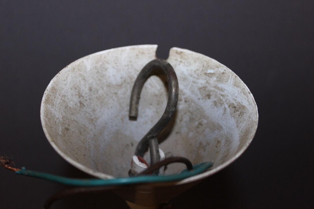 Sheet metal chandelier perforated by holophane circa 1950