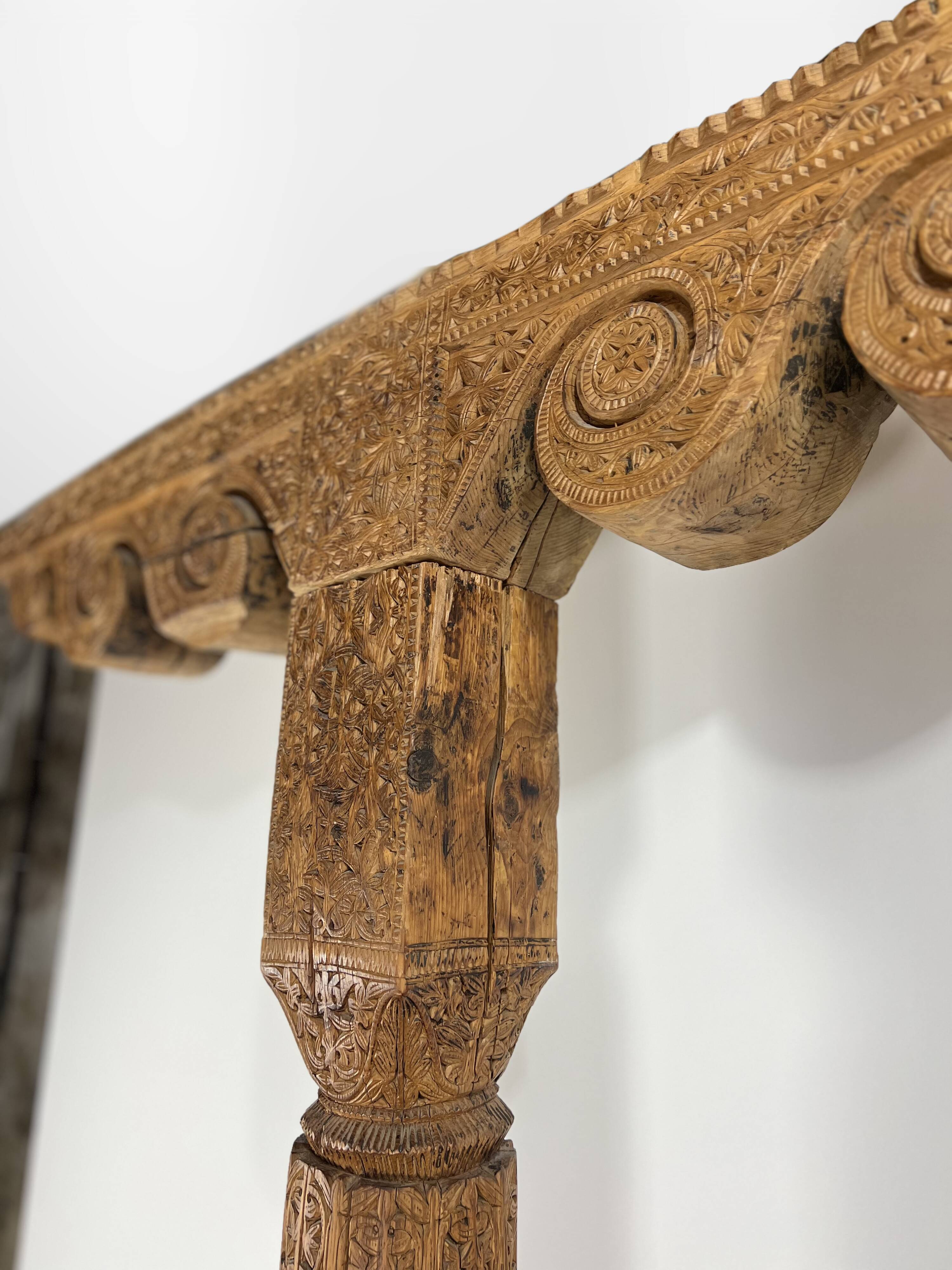 Ancient large carved cedar pillar column from Pakistan, India.