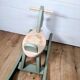 Green and beige wooden rocking horse