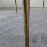 Tripod vintage black glass coffee table