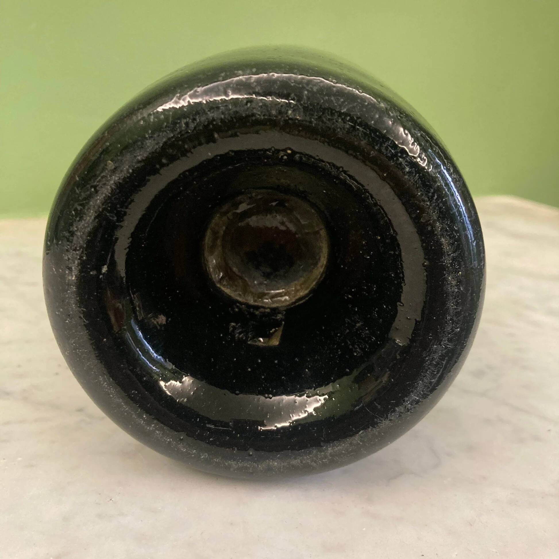 18th-century antique blown glass bottle