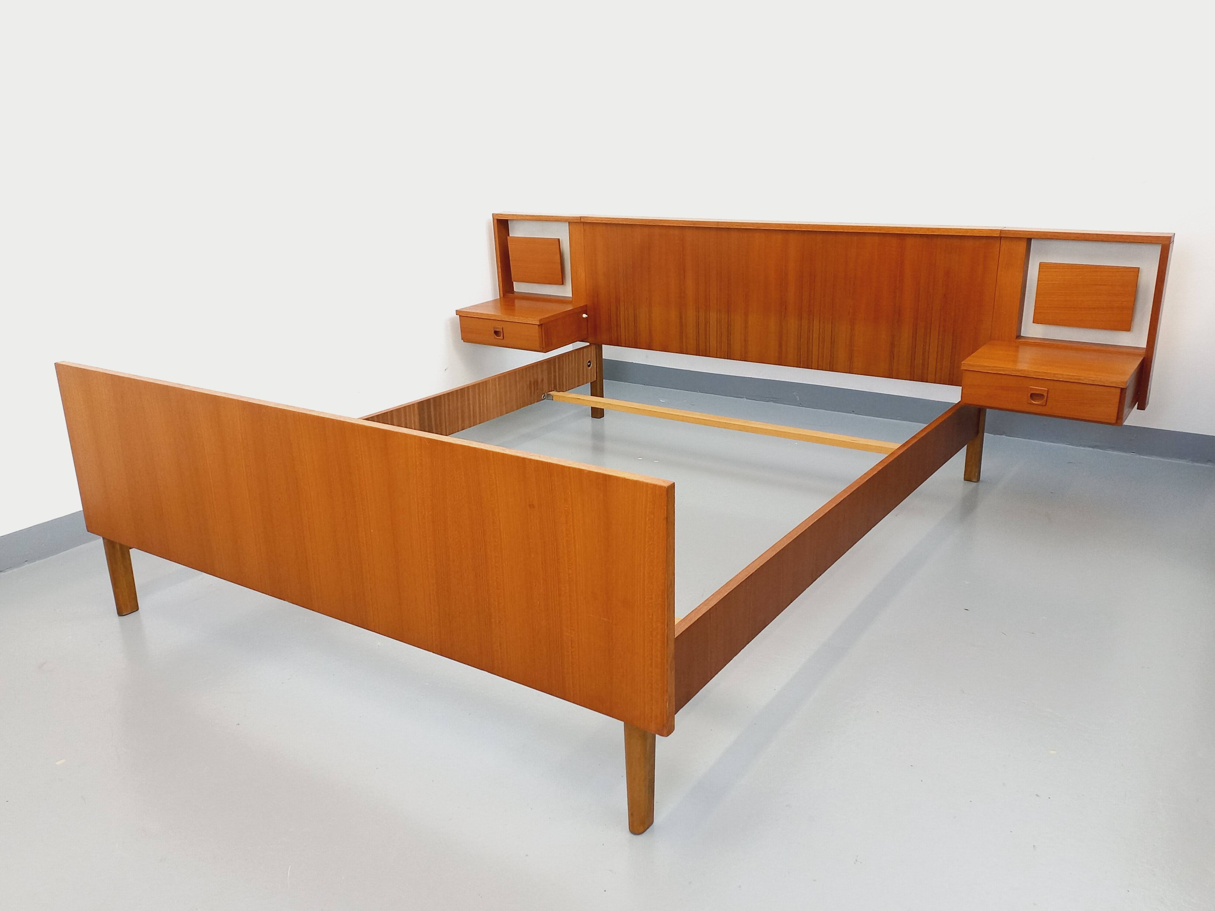 Vintage Scandinavian style double bed in teak from the 60s with integrated bedside lights