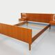 Vintage Scandinavian style double bed in teak from the 60s with integrated bedside lights