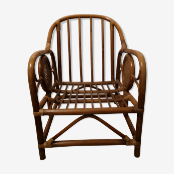 Rattan wicker armchair, armrest with cannage décor