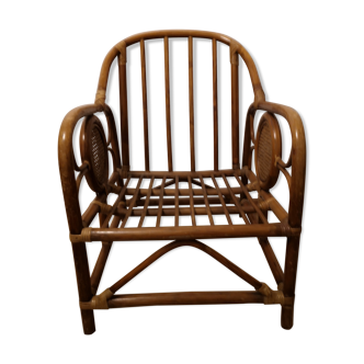 Rattan wicker armchair, armrest with cannage décor