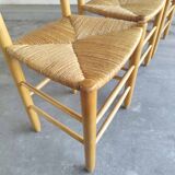 Lot 4 seated wooden chairs and straw backrest