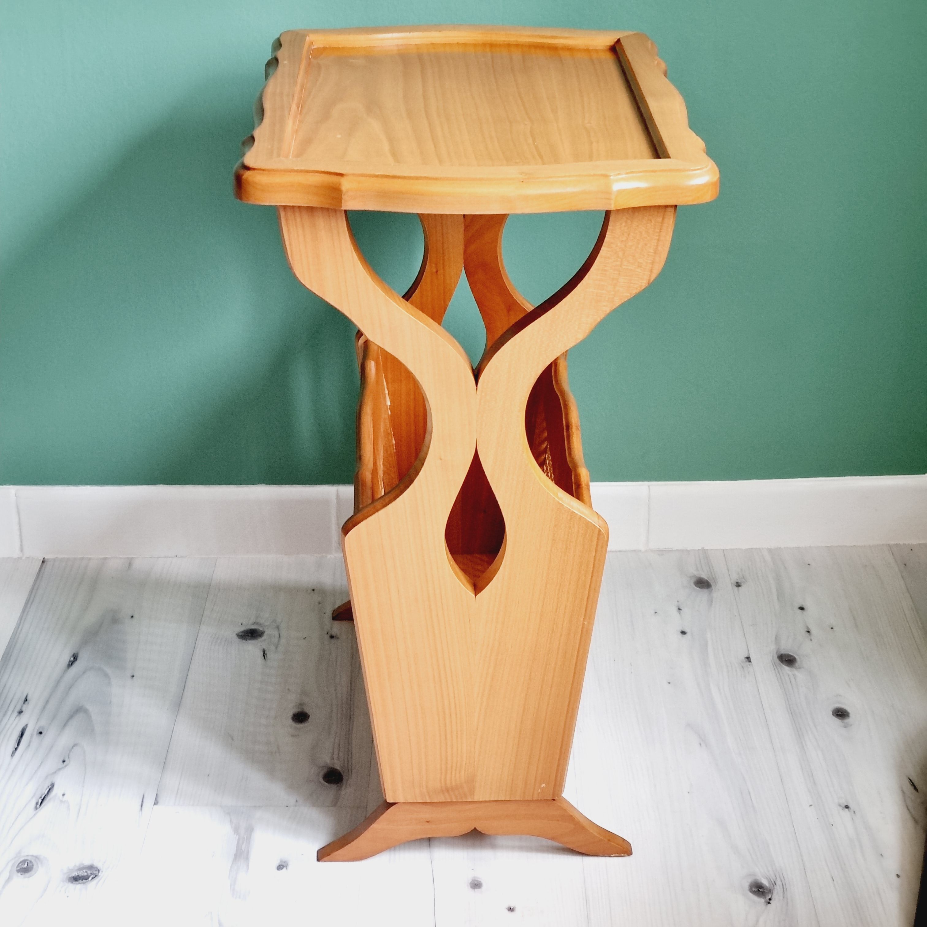 Side table with wooden and cane magazine holder
