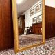 Antique English golden barock mirror mirror with large ornament