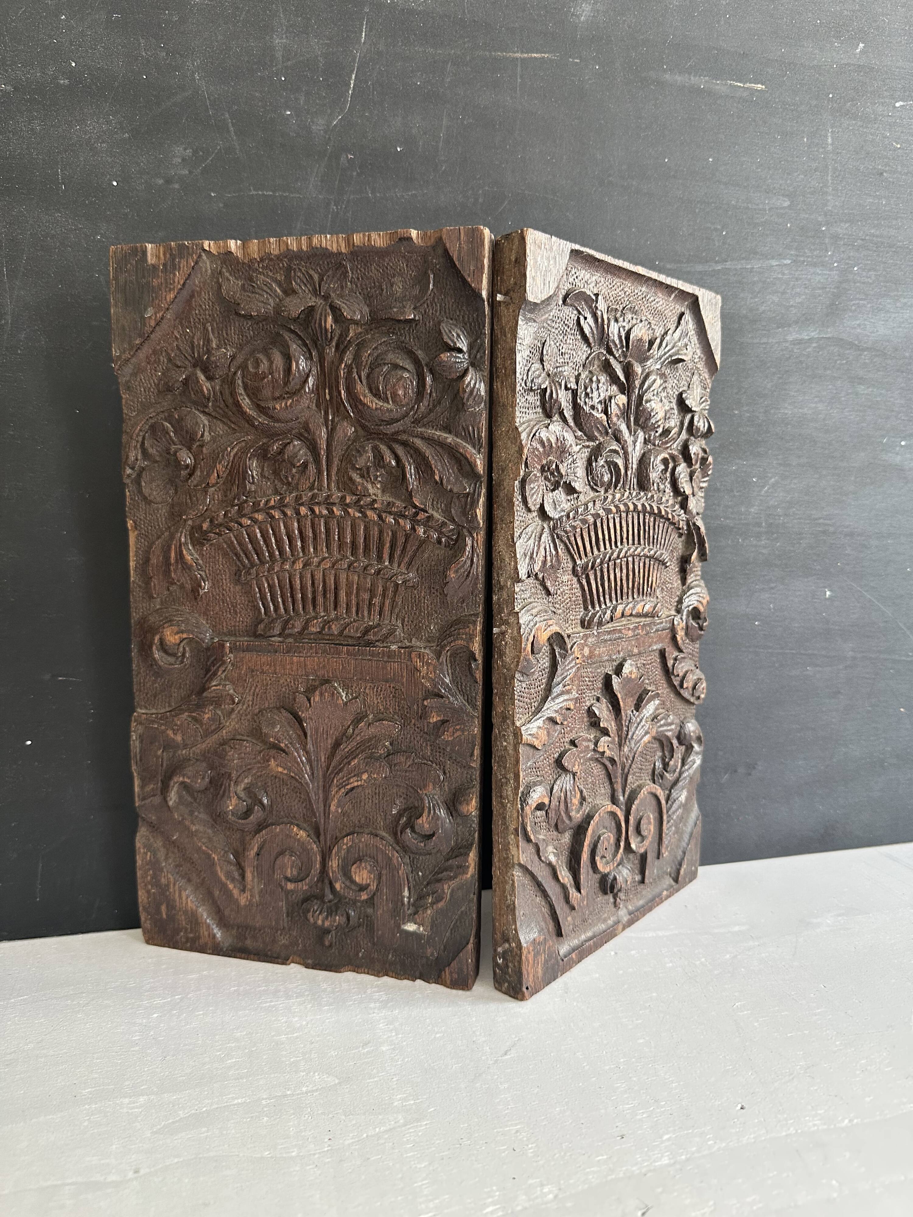 Pair of antique decorative panels in carved wood, 19th century