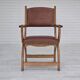 Années 1950, design danois, fauteuil retapissé, cuir marron naturel, bois de chêne.