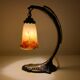 Bronze eagle lamp patinated and Art Nouveau style glass pate