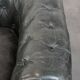 Set of 2 black Chesterfield armchairs in grained cowhide leather