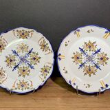 Pair of Nevers earthenware plates signed Georges