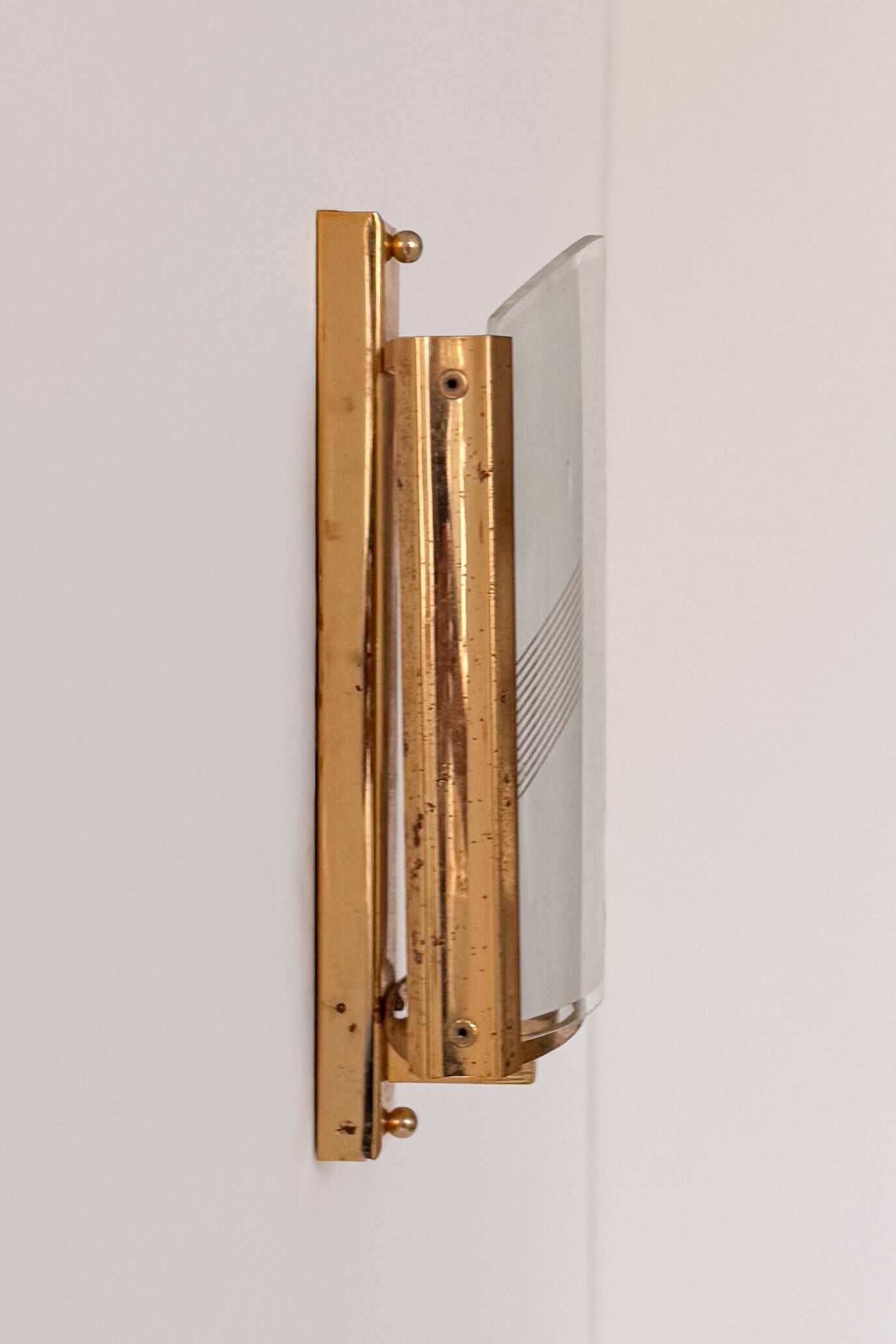 Vintage brass and glass wall light, France, 1970.